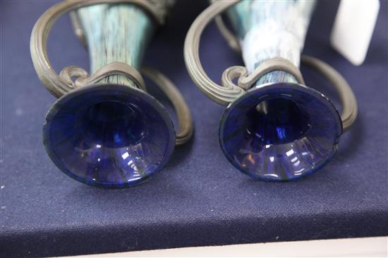 A pair of Loetz style iridescent glass vases, height 31.5cm, one broken, the other with rim chips